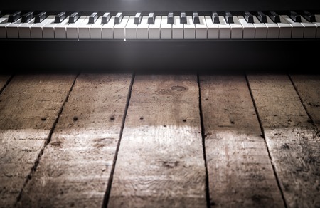 piano on wooden background closeup ,concept musical instrumentsの写真素材