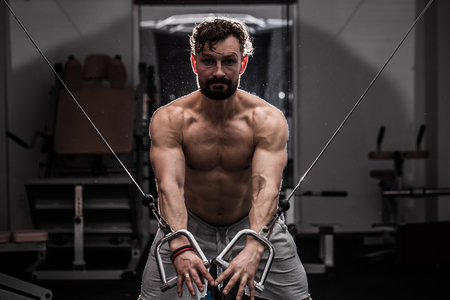 training cross fit in the gym,muscular man is at the gym,the concept of sportの写真素材