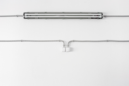 Electrician wire on the white walls,the concept of electricians and construction ,repairの写真素材