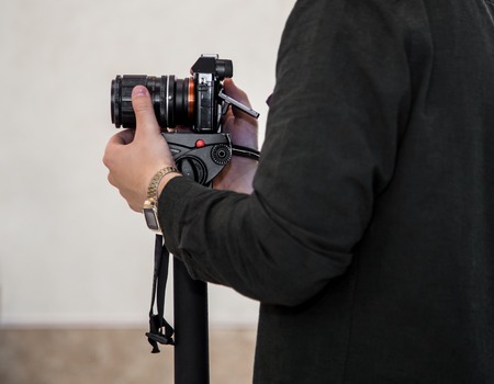 Man shoots at the camera ,concept videoの写真素材