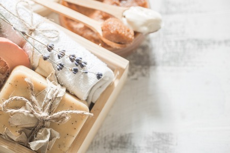 Natural soap Spa set in wooden box place for text on white background, concept of body care and healingの写真素材