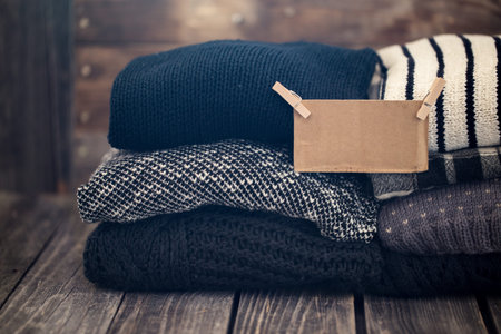 a stack of knitted sweaters