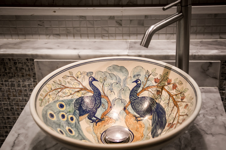 Stylish sink with a beautiful ornament in the art Nouveau style in the bathroom, closeupの写真素材