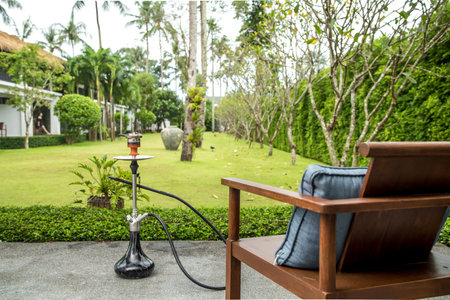 smoking hookah on vacation background lifestyle concept