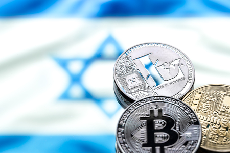 coins Bitcoin and litecoin, against the background of the Israeli flag, concept of virtual money, close-up. Conceptual image of digital crypto currency.の写真素材