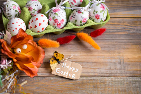 Easter eggs on a wooden background, concept of holidays