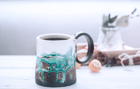 Beautiful cup of tea on a wooden background, the concept of coziness and pastimeの写真素材