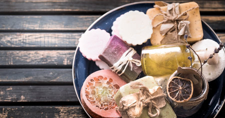 still life of spa with handmade soap on a beautiful wooden background, concept of spa relaxation and...