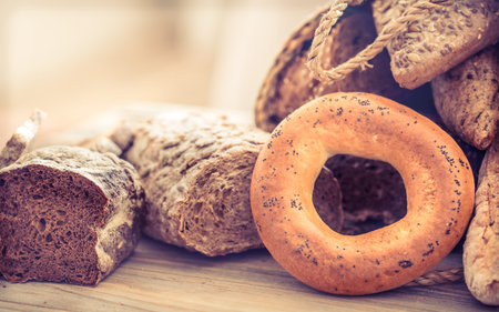 composition with fresh bread on a wooden background