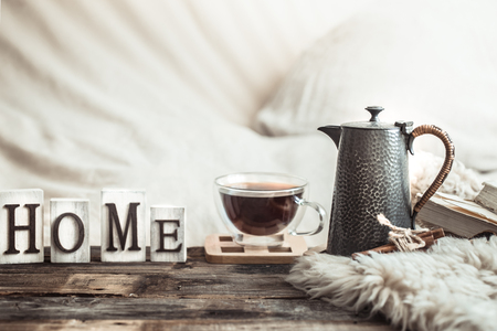 home atmosphere in the interior with wooden letters and home decor items, comfort conceptの写真素材