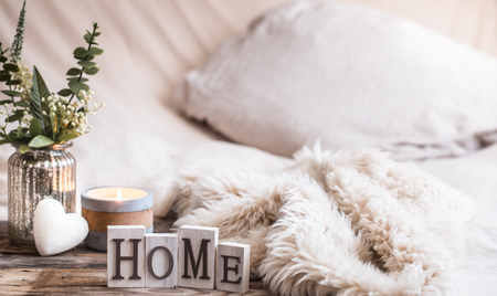 still life homely atmosphere in the interior with home decor items, the concept of comfort and cozinessの写真素材