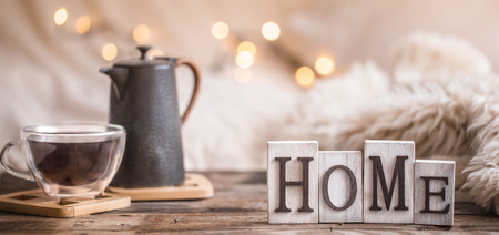home atmosphere in the interior with wooden letters and home decor items, comfort conceptの写真素材