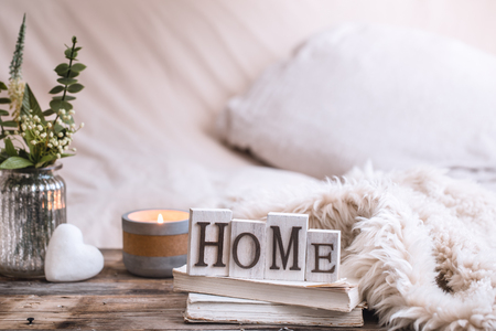 still life homely atmosphere in the interior with home decor items, the concept of comfort and cozinessの写真素材