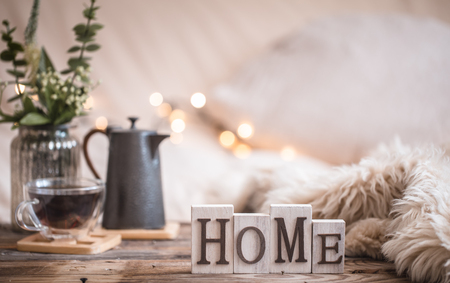 home atmosphere in the interior with wooden letters and home decor items, comfort conceptの写真素材