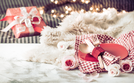 Valentine's Day, a gift on a wooden background in a homely atmosphere, the concept of holiday and friendshipsの写真素材