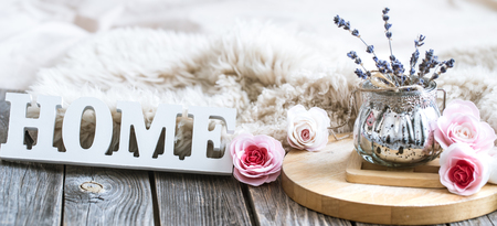 Cozy home composition on wooden background, home decor conceptの写真素材