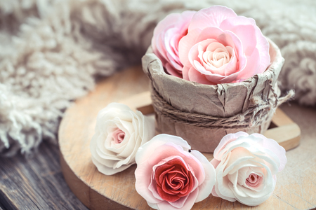 Valentine's day concept, roses of different colors in a box on a wooden backgroundの写真素材