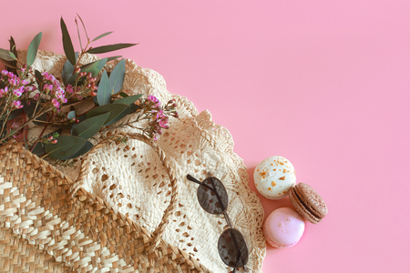 Spring Accessories and Clothes on a pink background, space for text.の写真素材
