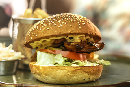 Fast food, french fries with a sandwich in a cafe, fast food conceptの写真素材