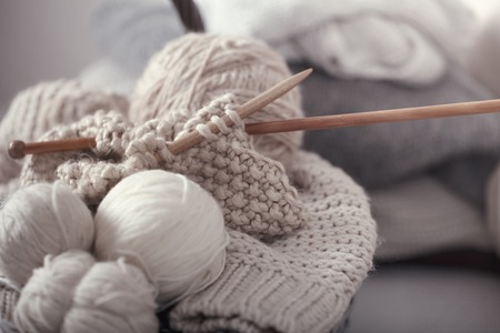 Vintage wooden spokes and threads macro, still life photo. The concept of cozy and hobbyの写真素材
