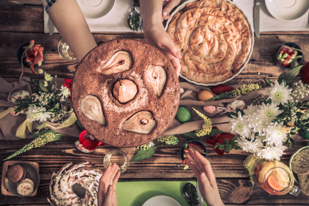 Home Celebration of friends or family at the festive table with pear cake, top view, celebration Conceptの写真素材