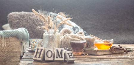 Still life details of home interior on a wooden table with letters home, the concept of coziness and home atmosphere .Living roomの写真素材