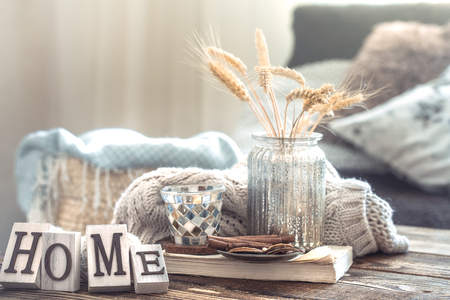 Still life details of home interior on a wooden table with letters home, the concept of coziness and home atmosphere .Living roomの写真素材