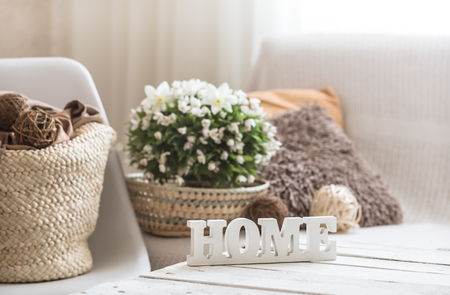 still life in the living room with wooden inscription home, the concept of home comfortの写真素材