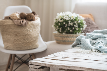 still life in the living room with white chair and home decor , the concept of home comfortの写真素材