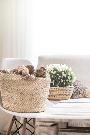 still life in the living room with white chair and home decor , the concept of home comfortの写真素材