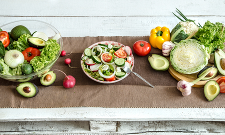 Preparation of healthy food from organic products on the table. The concept of healthy food and home cooking . Top viewの写真素材