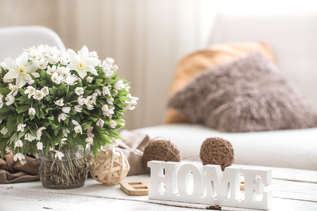 still life in the living room with wooden inscription home, the concept of home comfortの写真素材