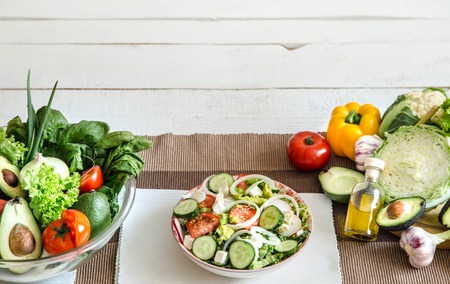 Preparation of healthy food from organic products on the table. The concept of healthy food and home cooking . Top viewの写真素材