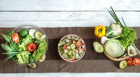 Preparation of healthy food from organic products on the table. The concept of healthy food and home cooking . Top viewの写真素材
