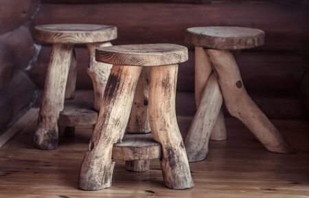 Handmade wooden exclusive chairs on the veranda.の写真素材