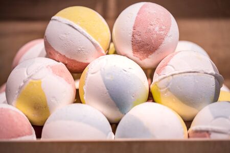 Shop natural cosmetics, bright salt bombs for baths handmade. The concept of eco cosmetics and body careの写真素材