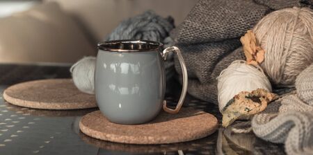 Cozy Autumn still life background with a beautiful Cup of hot drink . Close up.の写真素材