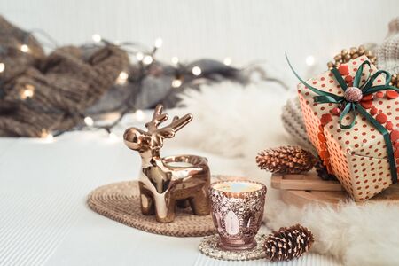 Christmas still life background with festive decor, in a cozy home atmosphere . The concept of celebrating New year and Christmas.の写真素材