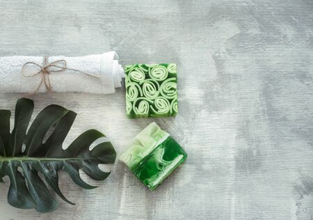 Spa composition with body care items and plants on a light background. The view from the top.の写真素材