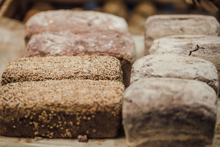 Fresh bread on the counter in the store, close-up . Healthy food and organic products.