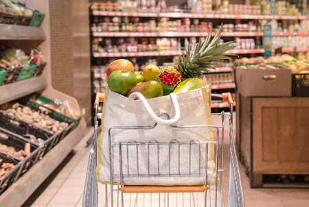 Eco bag with different fruits and vegetables. Shopping at the supermarket . Healthy food .の写真素材