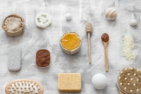 Spa-still life of skin care items on a light background. Natural scrub and soap with items to cleanse the skin. The concept of health and body care .の写真素材