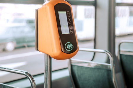 Automatic contactless payment for public transport, close-up. Payment by card, Bank transfer .
