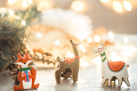 Festive beautiful new Year background with lights and gingerbread. The concept of the celebration.の写真素材