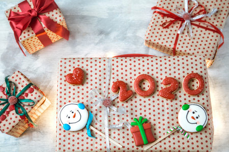 Holiday boxes with gingerbread, top view. The concept of the celebration and gifts.