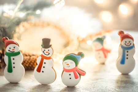 Festive beautiful new Year background with lights and gingerbread. The concept of the celebration.の写真素材