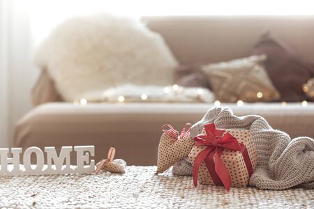 The concept of Valentine's day. Gift box on the table in the cozy living room.の写真素材