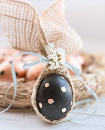 Decorated Easter eggs in black with gold pattern. The concept of the Easter holiday .の写真素材