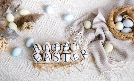 Easter eggs with the inscription happy Easter, holiday decor . Still life with an Easter cozy mood.
