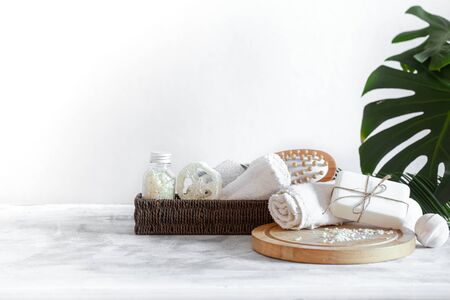 Spa composition with body care items on a light background . A place for text, a concept of beauty and body care .の写真素材